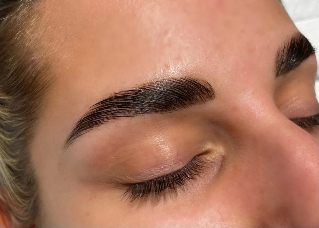 Close up of a laminated brow showing individual hairs after brow lamination at HQ Aesthetics in Melville, Perth